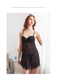 Detailed view of black lace lingerie nightgown with sheer mesh and bow accent