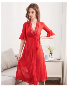 Detail of red mesh robe with delicate lace trim, ruffle sleeves and silk waist tie