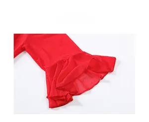Close-up of red mesh lingerie featuring delicate layered ruffles and sheer fabric details
