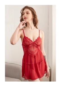 Close-up of elegant red lace V-neckline and sheer mesh fabric on sexy nightgown