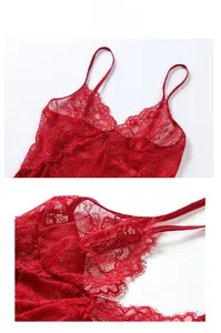 Close-up of red floral lace detail with eyelash fringe on a luxury silk nightgown