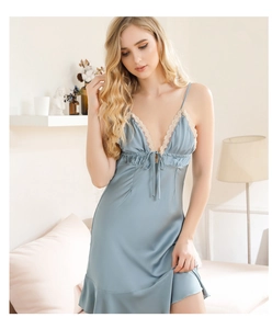 Detail of light blue silk nightgown featuring deep V-neck lace trim and drawstring