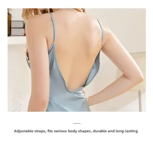 Detail view of adjustable spaghetti straps on backless silk nightgown in light blue