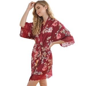 Women's red satin floral robe with lace trim and waist tie for elegant loungewear style