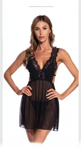 Detailed close-up of sheer floral lace bodice and deep V-neckline on a black nightgown