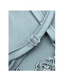 Detail of adjustable straps and lace embroidery on ice silk satin pajama set