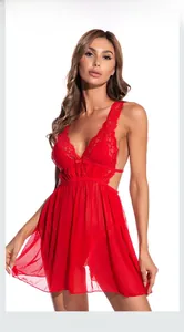 Detail of red lace mesh nightgown featuring intricate floral embroidery and deep V-neckline