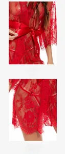 Detailed view of red floral sheer lace robe with delicate eyelash trim and satin ribbon