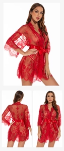 Macro shot of red sheer mesh robe featuring intricate floral lace and eyelash lace trim