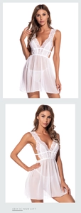 Detail view of the intricate V-neck floral lace and sheer mesh on a white babydoll nightgown