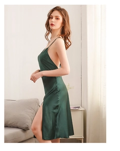 Detail of emerald green silk satin nightgown featuring deep V-neck and open back design