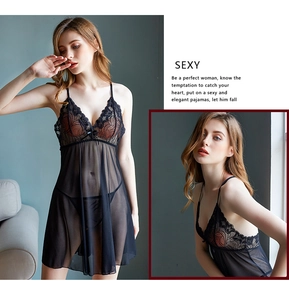 Detail of black lace embroidery and sheer mesh fabric on a sexy V-neck chemise