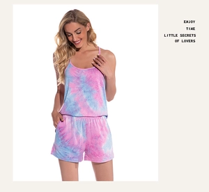 Detail view of pink and blue tie-dye pajama set featuring a camisole and matching shorts