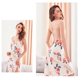 Detail of floral satin nightgown with backless criss-cross straps and side split hem
