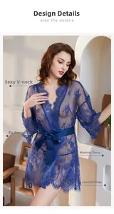 Detailed close-up of dark blue sheer eyelash lace robe with satin sash and floral patterns