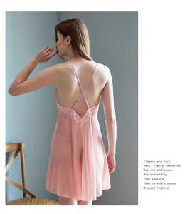 Detailed back view of pink lace nightdress with cross-straps and V-shaped mesh detail