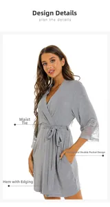 Detail view of grey modal robe with lace cuffs, waist tie, and functional side pockets