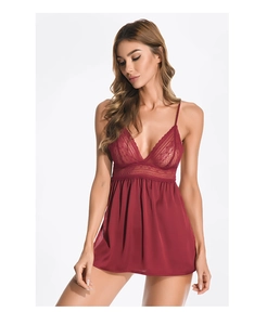 Close-up of wine red lace stitching and silky satin fabric on a sexy V-neck nightgown