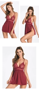 Detail of wine red lace stitching and sheer tulle fabric on sexy V-neck nightgown