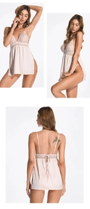 Detail of pink satin nightgown with floral lace V-neckline and high side slit