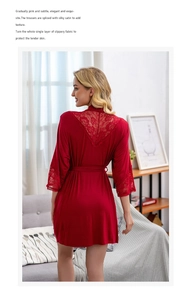 Detailed back view of a burgundy modal bathrobe with elegant lace stitching on the back and cuffs
