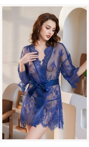Detail of sheer dark blue lace robe featuring delicate eyelash trim and silk belt