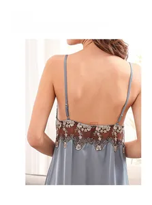 Detail of grey-blue silk satin nightgown featuring sheer floral lace back and thin straps