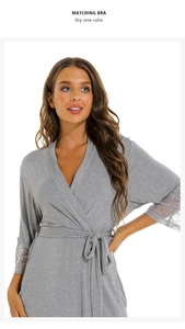Detail of soft dry rose modal bathrobe featuring intricate lace splicing on the sleeves