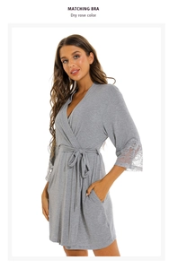 Detailed view of grey modal bathrobe with elegant lace stitching on the sleeves