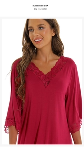 Close-up of lace-trimmed V-neckline and sleeve details on dry rose modal sleepwear