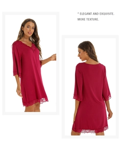 Close-up of deep red V-neck modal sleepwear dress with elegant lace trim details