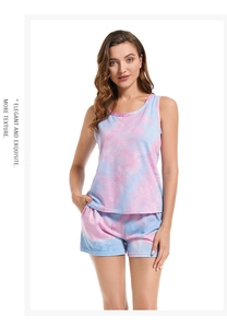 Close-up of tie-dye modal cotton sleepwear set featuring round neck top and shorts with pockets