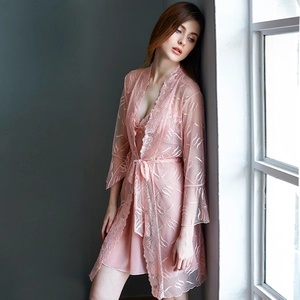 Three-piece pink lace lingerie set with sheer silk robe and matching nightgown