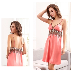 Detail of coral silk satin sleepwear with brown floral lace patchwork and backless design
