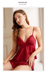 Detailed close-up of dry rose color silk pajama set with elegant lace trim