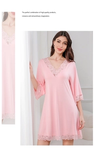 Detailed view of pink modal nightdress with delicate lace V-neckline and sleeve trim