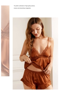 Detailed view of caramel silk camisole set with lace V-neck and ruffled satin shorts