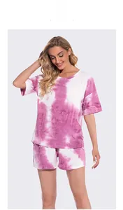 Detailed view of women's purple tie-dye loungewear set featuring round neck t-shirt and shorts