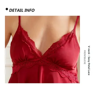 Detail view of burgundy satin nightwear with V-neckline and elegant floral lace trim