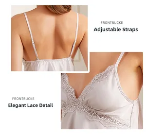 Details of satin pajama set featuring adjustable straps and delicate lace patchwork