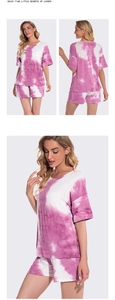 Detail of pink tie-dye modal pajamas set featuring short sleeve top and matching shorts