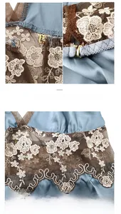 Detailed view of blue satin sleepwear featuring brown lace with white floral embroidery