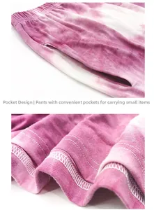 Detail of tie-dye loungewear pants showing elastic waistband, side pockets and neat hem stitching
