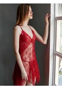 Detailed view of red sheer lace nightgown with deep V-neck and delicate bow accent