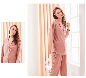 Detail of silk pajamas showing contrast piping on rose pink long-sleeved loungewear set