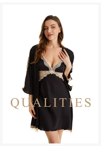 Detail view of black silk satin robe and V-neck chemise with delicate beige lace trim