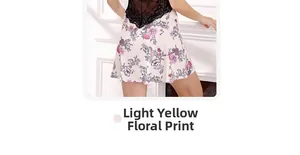Détail de la nuisette à imprimé floral jaune clair avec dentelle noire au dos ouvert
