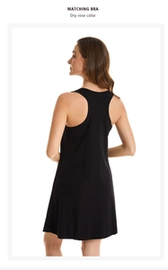 Close-up of racerback detail on a black cotton stretch nightdress with soft texture