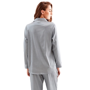 Elegant grey silk satin pajama set for women featuring long sleeves with white piping detail