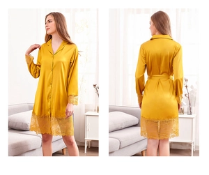 Detail of yellow silk robe featuring lace拼接 sleeves and hem in a cozy home setting